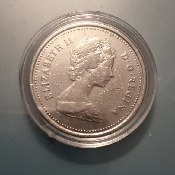1984 CANADA 25 CENT PIECE - Picture 1 of 3